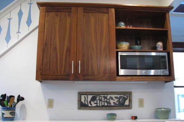 Black walnut kitchen cabinets.